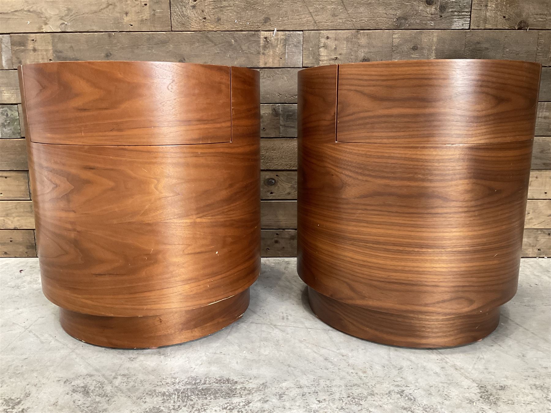 Pair of walnut circular barrel shaped lamp tables, fitted with single drawer