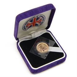 Queen Elizabeth II 2003 gold half sovereign coin, housed in a purple case