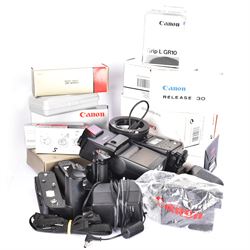 Collection of Canon camera accessories, predominantly for SLR cameras, including flashes, motor drives, quartz date back grips, filters, etc, mostly boxed or cased 