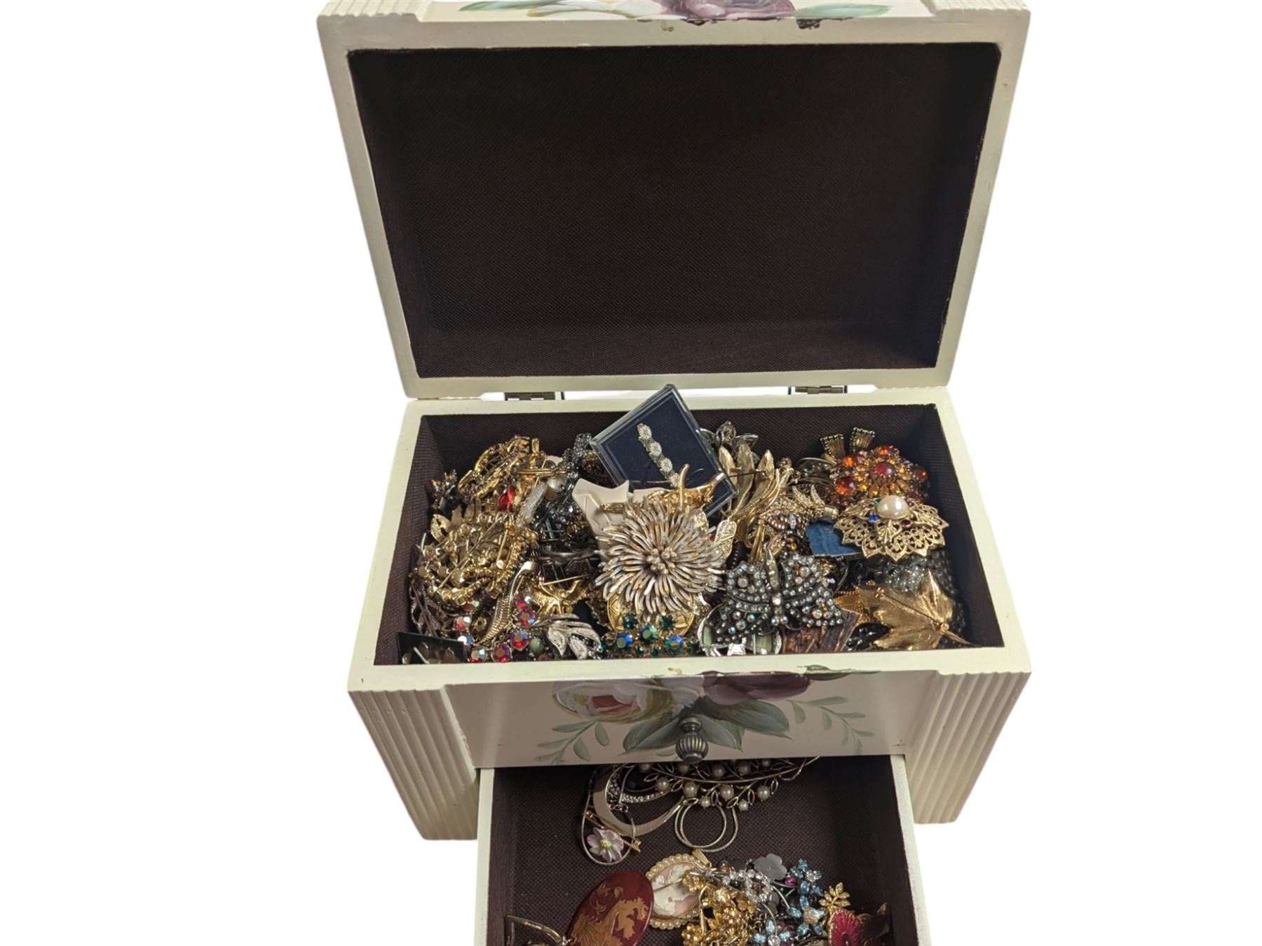 Collection of costume brooches, including ceramic, novelty and animal examples, contained within a white jewellery box