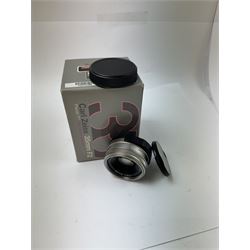 Carl Zeiss Planar 2/35 35mm T* lens, serial no. 8034530, for Contax G mount, boxed with warranty and two lens caps