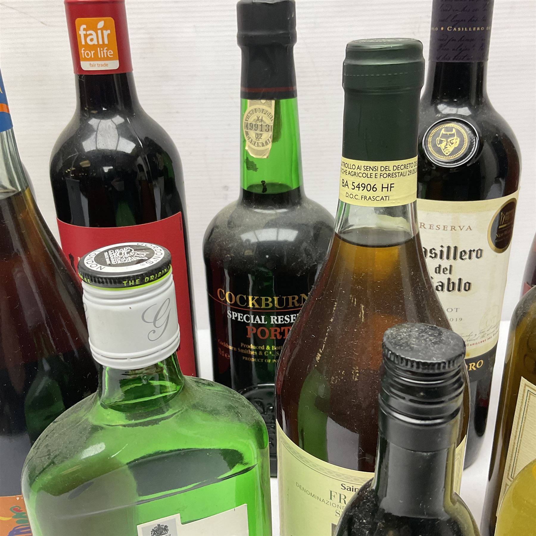 Mixed alcohol, including Cockburn's special reserve port, Casillero del Diablo Merlot, etc