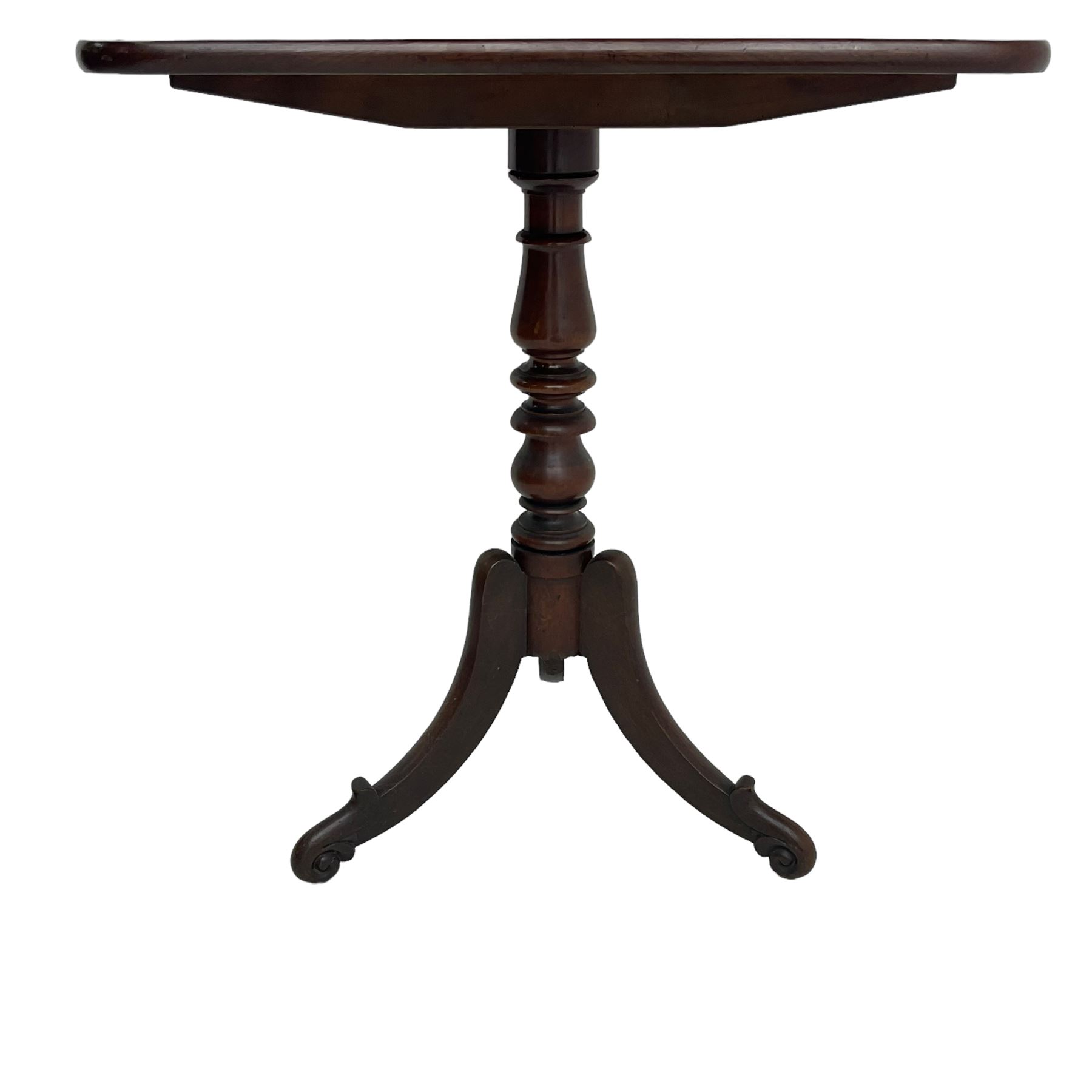 Victorian mahogany tripod table, rectangular tilt-top with rounded corners, on turned pedestal, three splayed supports with scroll carved terminals