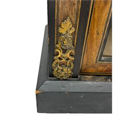 Victorian ebonised and walnut pier cabinet, rectangular top over figured frieze with central star motifs, enclosed by single glazed door, decorated with cast gilt metal mounts and beading, on chamfered plinth base 