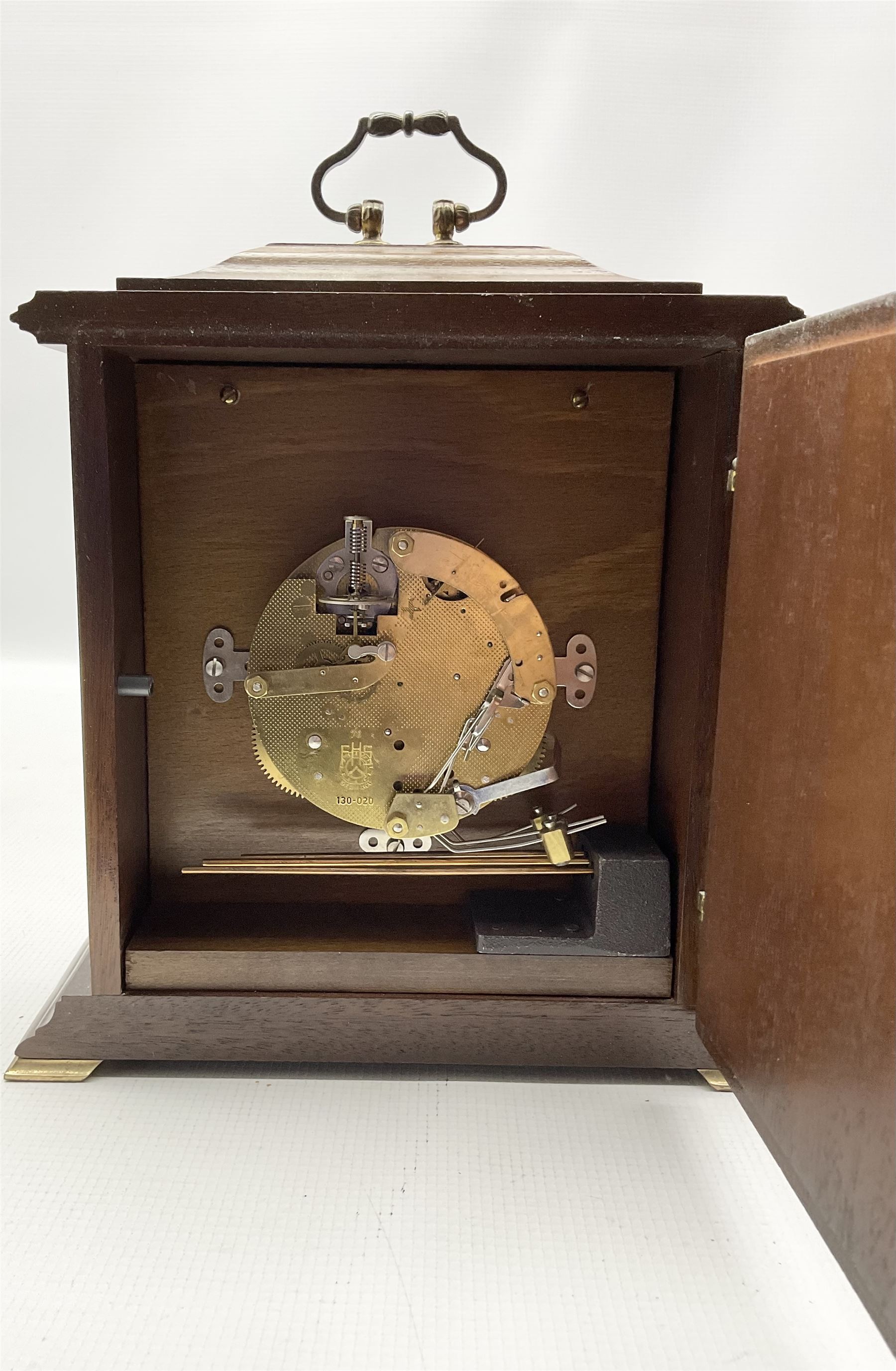 20th oak cased mantle clock, German spring driven movement striking the hours on three gong rods.