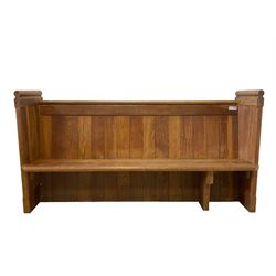 19th century oak church pew or hall bench, moulded cresting rail over panelled back and plank seat, on panelled end supports with chamfered frames