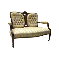 Edwardian rosewood two-seat settee, shaped back with inlaid decoration and carved crest, u...