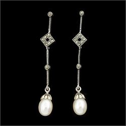 Pair of silver marcasite and pearl pendant stud earrings, stamped 925