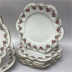 Shelley Late Foley part tea service, pattern number 10137, decorated with roses, comprising eleven teacups and twelve saucers, milk jug, sugar bowl, twelve side plates and two sandwich plates (39)