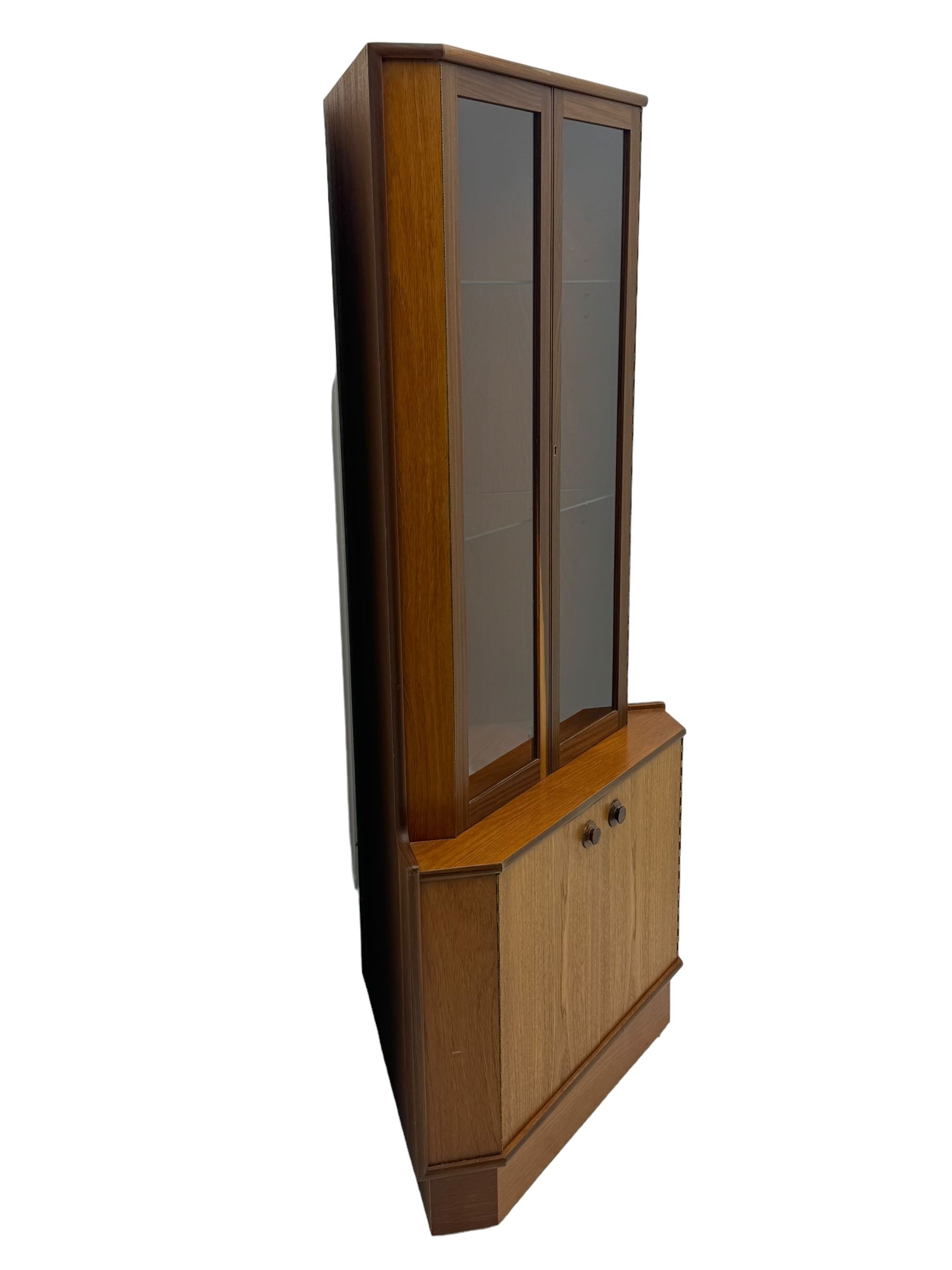 Nathan - teak corner display cabinet, double glazed doors enclosing two adjustable shelves over single cupboard.