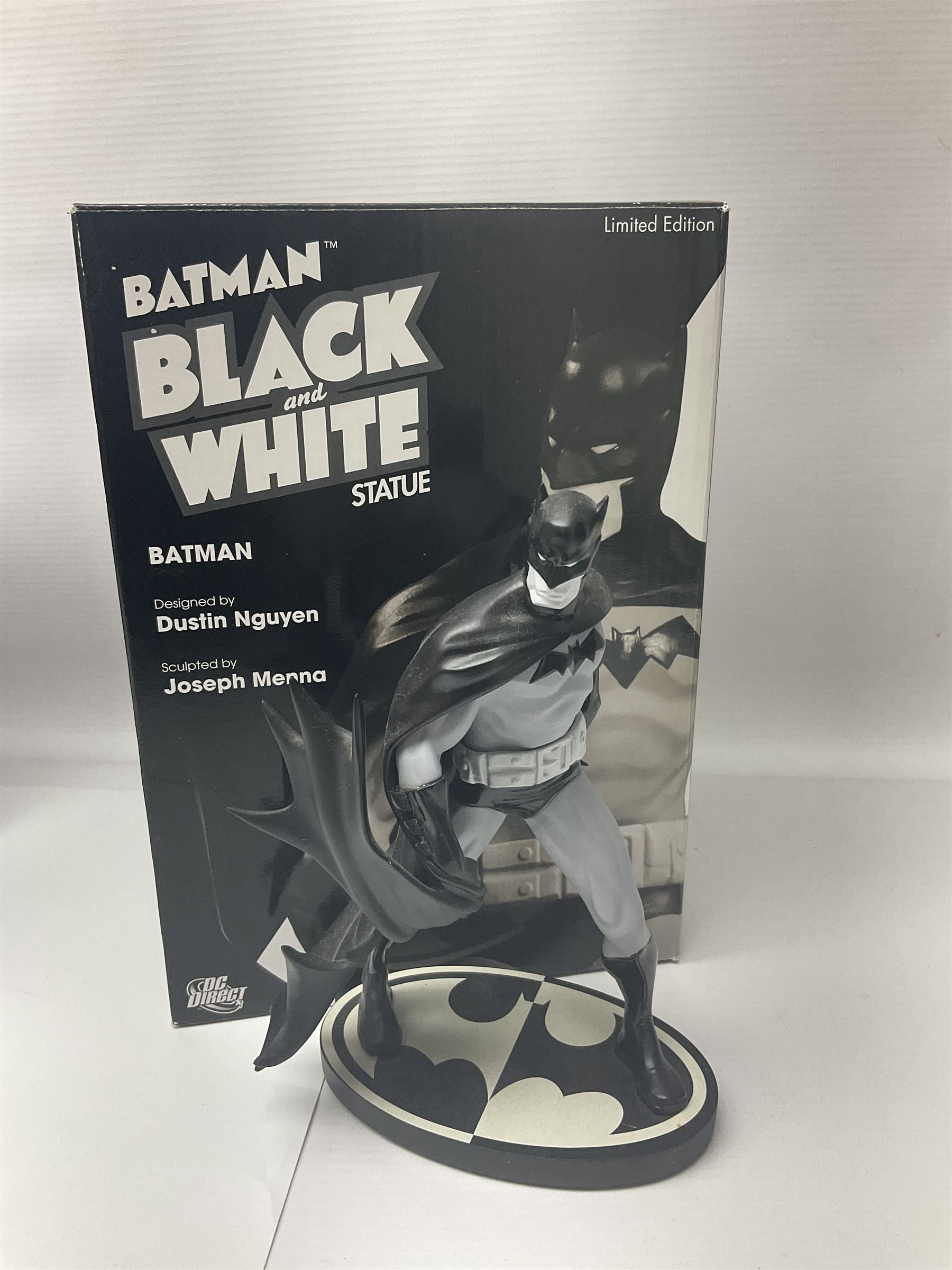 Group of five limited edition DC Direct Black and White Batman hand-painted cold-cast porcelain statues in original boxes, with two similar examples from DC Collectibles 