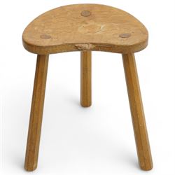 Mouseman - oak three-legged milking stool, dished kidney-shaped seat carved with mouse sig...