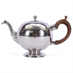 George II Scottish silver teapot, of bullet form with reeded spout and wooden scroll cappe...