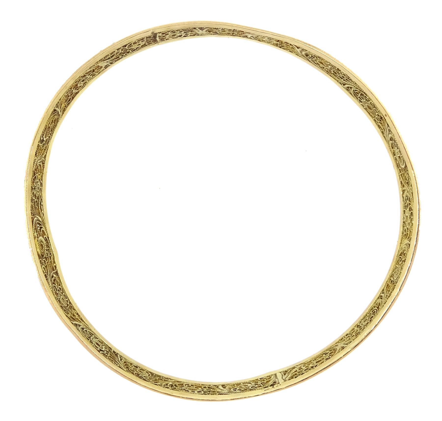 Middle Eastern gold bangle with filigree decoration