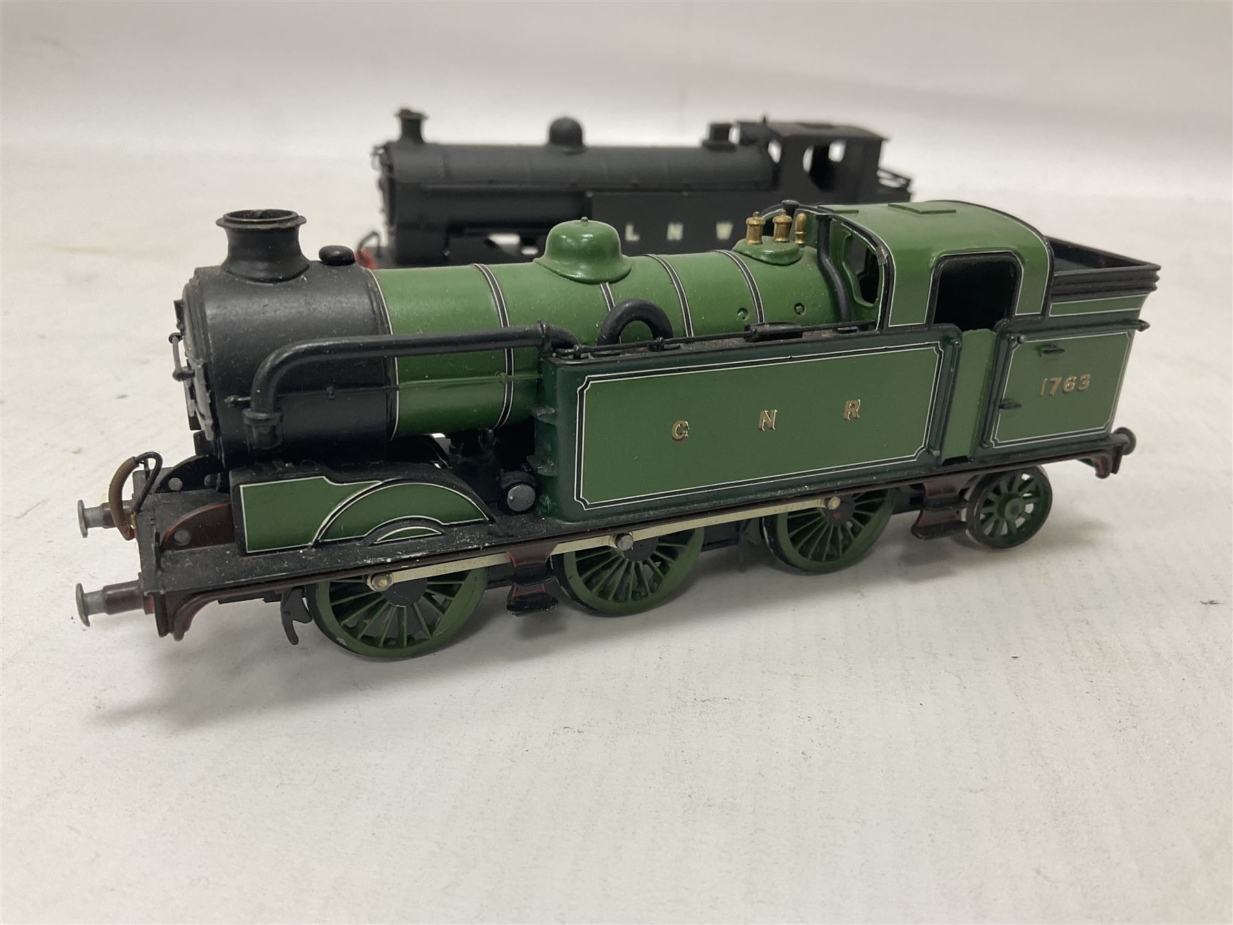 ‘00’ gauge - three kit built steam locomotives comprising LNWR Class 1185 0-8-2 finished in black; Class N7 0-6-2T no.9618 finished in LNER black; Class N2 0-6-2T no.1763 finished in GNR green (3) 