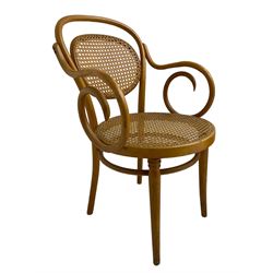 After Michael Thonet - bentwood armchair, circular cane seat and back, scrolled arms