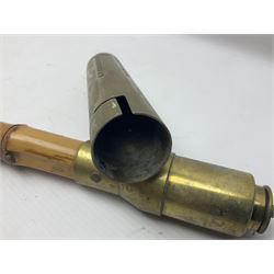 Bamboo cane torch, the pierced brass cover opening to reveal a wick, H144cm