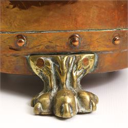 19th/ early 20th century copper coal bin, having twin cast brass handles, riveted base and three brass lion paw supports, H30cm, W42cm 