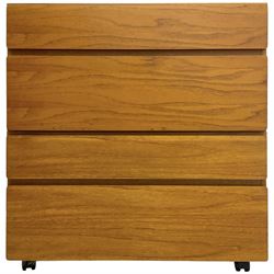 Mid-20th century teak four-drawer chest, featuring a minimalist design with two shallow and two deep flush drawer fronts, each with recessed handles along the top edge, the drawers open to reveal white laminate interiors, supported by castors