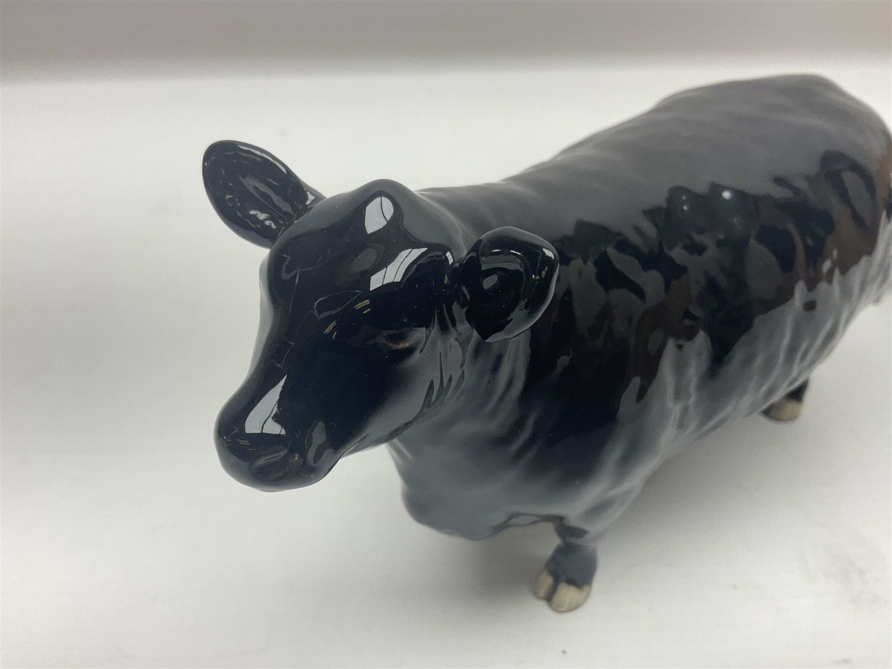 Beswick Aberdeen Angus family group, comprising bull 1562, cow 1563 and calf 1827A