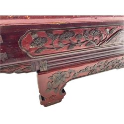 Mid-19th century Qing dynasty opium or wedding bed, Zhejiang province, rectangular top with weave cane work, the frieze rail carved with trailing leafy branches and flower heads, over moulded rail with small drawer, shaped base carved with further tailing foliate decoration terminating to shaped feet, united by stretchers 