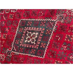 Persian Meymeh red ground rug, stepped lozenge medallion and spandrels, decorated all over with tree of life motifs, the main border decorated with repeating stylised plant motifs within geometric guard stripes 