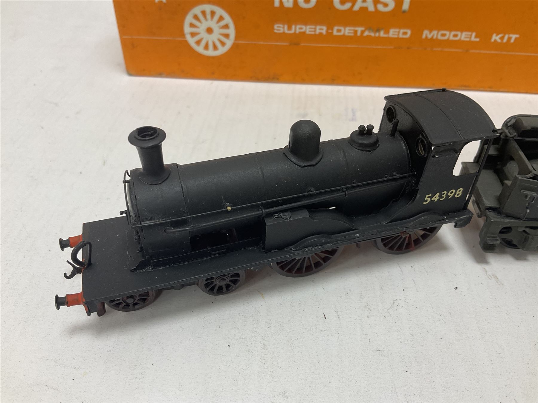 ‘00’ gauge - two kit built steam locomotives comprising unnamed LMS/HR Drummond Class C/BEN 4-4-0 no.54398 finished in BR black; Class Q6 0-8-0 no.63344 finished in BR black; both with Nu-Cast boxes (2) 