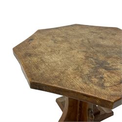 Mouseman - oak occasional table, octagonal adzed top, cruciform pedestal on sledge feet, carved with mouse signature, by the workshop of Robert Thompson, Kilburn 