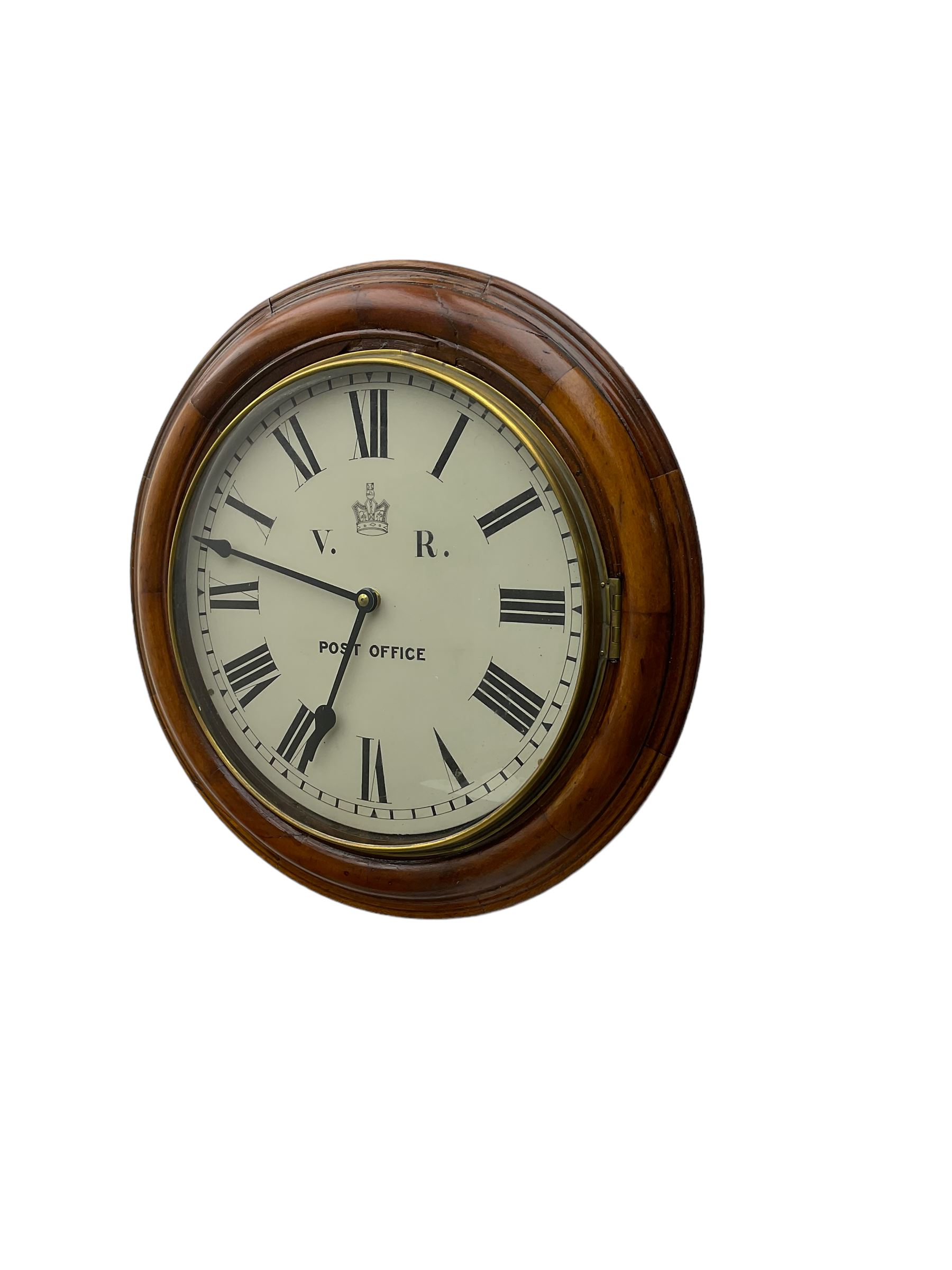 Round dial wall clock with a replacement quartz movement. Dial inscribed “Post Office VR”