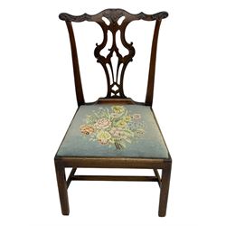 George III Chippendale design dining chair, shaped cresting rail carved with foliate scrolls over pierced and carved splat, floral needle-work upholstered drop-in seat, on square moulded supports united by H-stretchers 