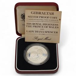 Mostly silver coins or medallions, including Gibraltar 1981 'Commemorating The Marriage of His Royal Highness The Prince of Wales and Lady Diana Spencer' silver proof crown, 2011 one ounce fine silver Britannia, Gibraltar 2012 'Diamond Jubilee' silver five pounds, two South Africa 2017 one ounce fine silver Krugerrands etc