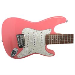 Dean Playmate 3/4 size left-handed electric guitar, in black finish, together with an Encore child's electric guitar, in pink finish, black H97cm, pink H81cm