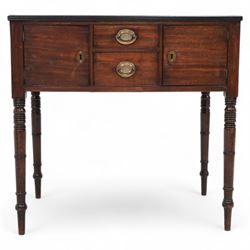 Georgian mahogany side table, rectangular reeded top over two small drawers and flanking cupboards, false drawer to the opposing side, fitted with carrying handles, on ring turned supports