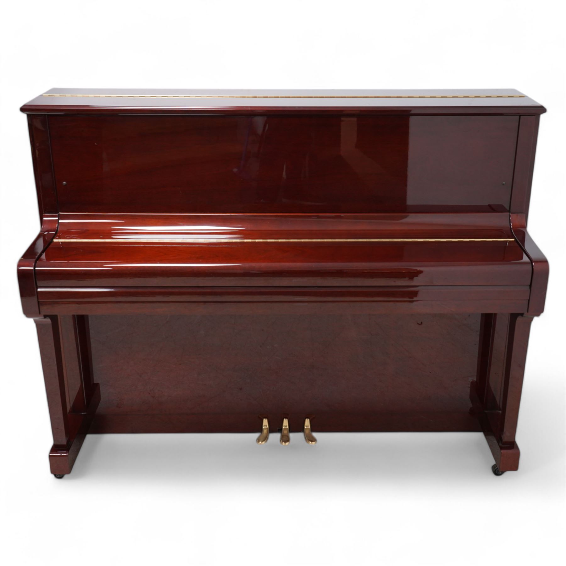 Boston - Upright overstrung piano in a lacquered mahogany case, designed by Steinway and manufactured by Kawai in Japan, Model 118E, serial No 131623 (1999), with 88 synthetic ivory/ ebony keys (seven octaves) with mute, una-corda and sustain pedals, original nickel plated tuning pins, hammers, strings and damper felts. With matching duet stool.