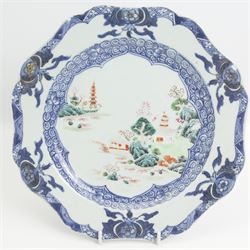 Pair of 18th century Chinese Export octagonal form blue and white plates, together with a similar plate, centrally decorated in polychrome enamels with a landscape scene, W22cm (3)