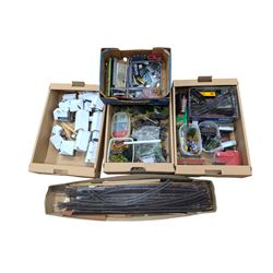 Large collection of '00' gauge model railway accessories, including buildings, scenery, ro...