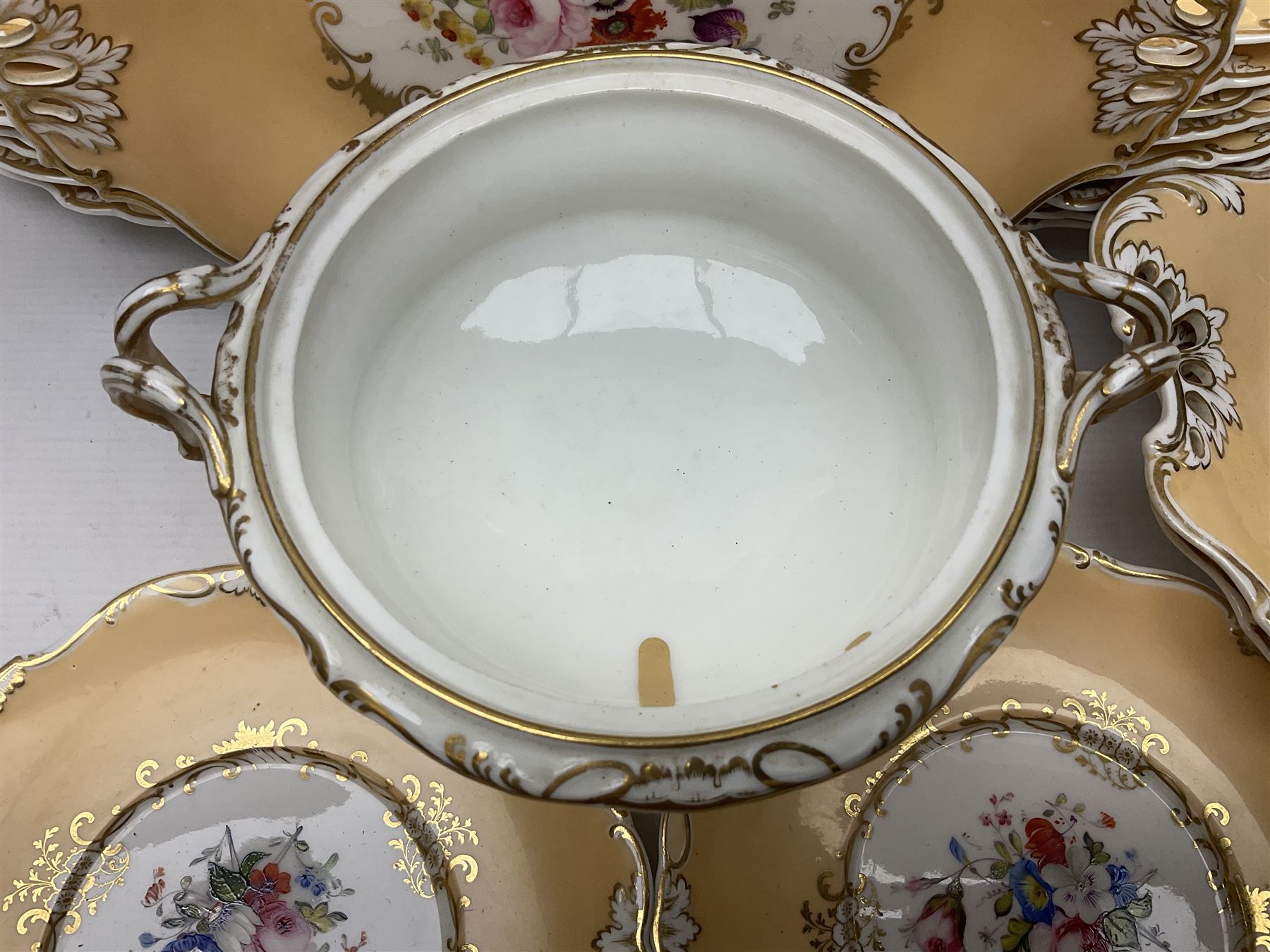 Victorian part dessert service, including eighteen plates, four small serving dishes, shallow dish, etc hand painted with floral sprigs within a cream border with floral panels, and heightened in gilt (26cm)