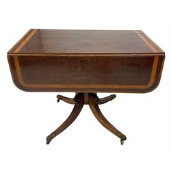 Early 19th century mahogany Pembroke table, rectangular drop-leaf top with rounded corners inlaid satinwood bands, single end drawer and opposing false drawer, turned pedestal on four acanthus carved and reed moulded splayed supports, cast brass cups and castors 