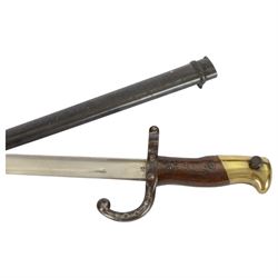 19th century French bayonet, with brass and wood mount, the steel blade engraved 'Mme. d'Armes de Chat. Mai 1878'