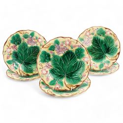 Set of six Wedgwood Majolica dessert plates, moulded and glazed with fruiting vine, strawberries and floral sprays, impressed marks beneath, D23cm (6)