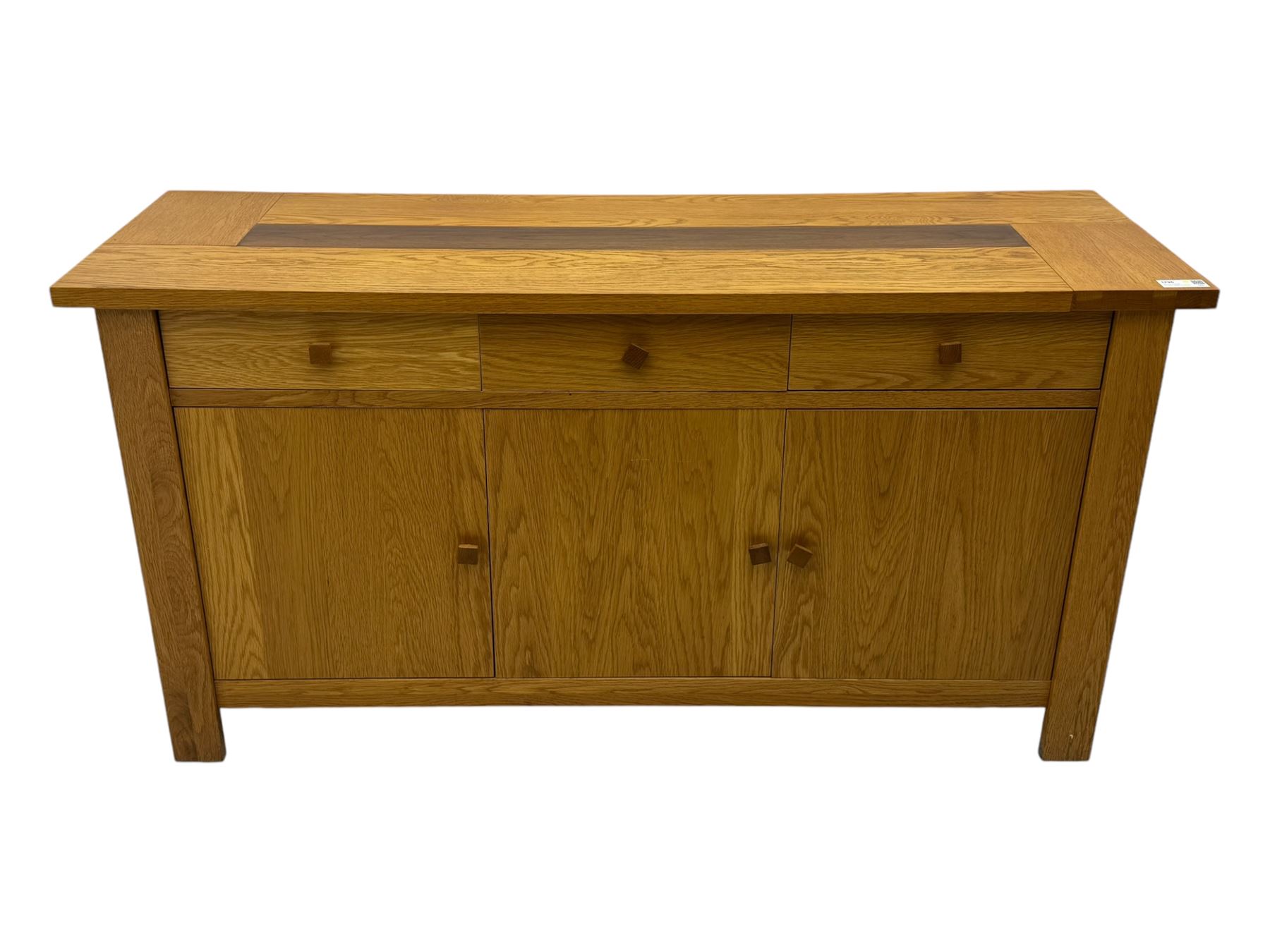 Contemporary oak sideboard, rectangular top with central contrasting plank, over three frieze drawers and three cupboards with enclosed shelving, on rectangular stile supports