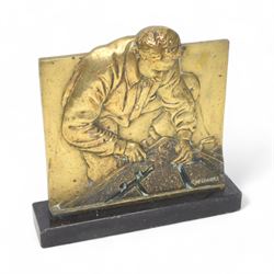 Robert Delandre (French 1879-1961): brass plaque depicting a stonemason, H27cm