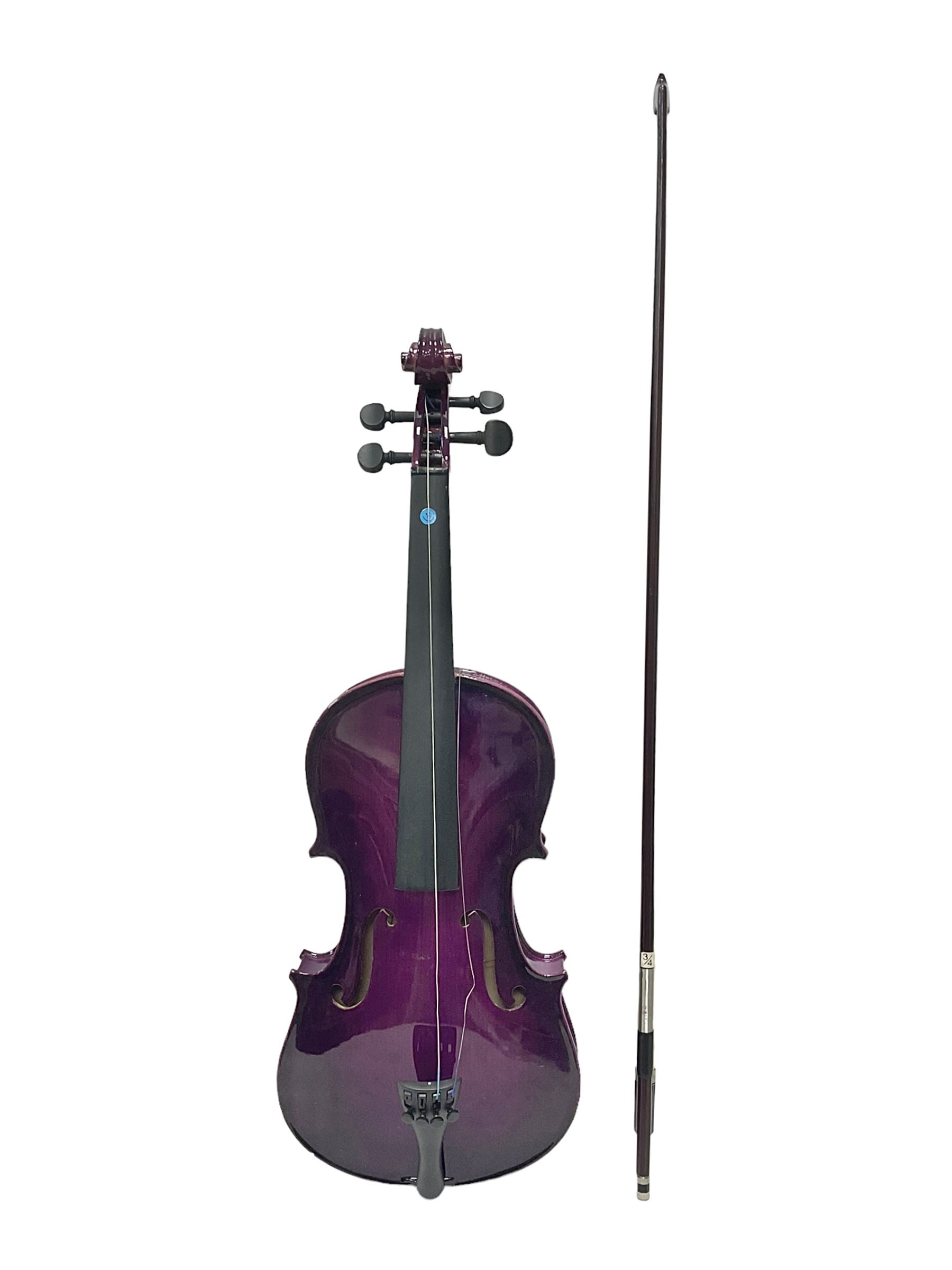 Intermusic 3/4 violin with a violet coloured solid wood body, ebonised fingerboard and fittings, bow and hard case, length 54cm