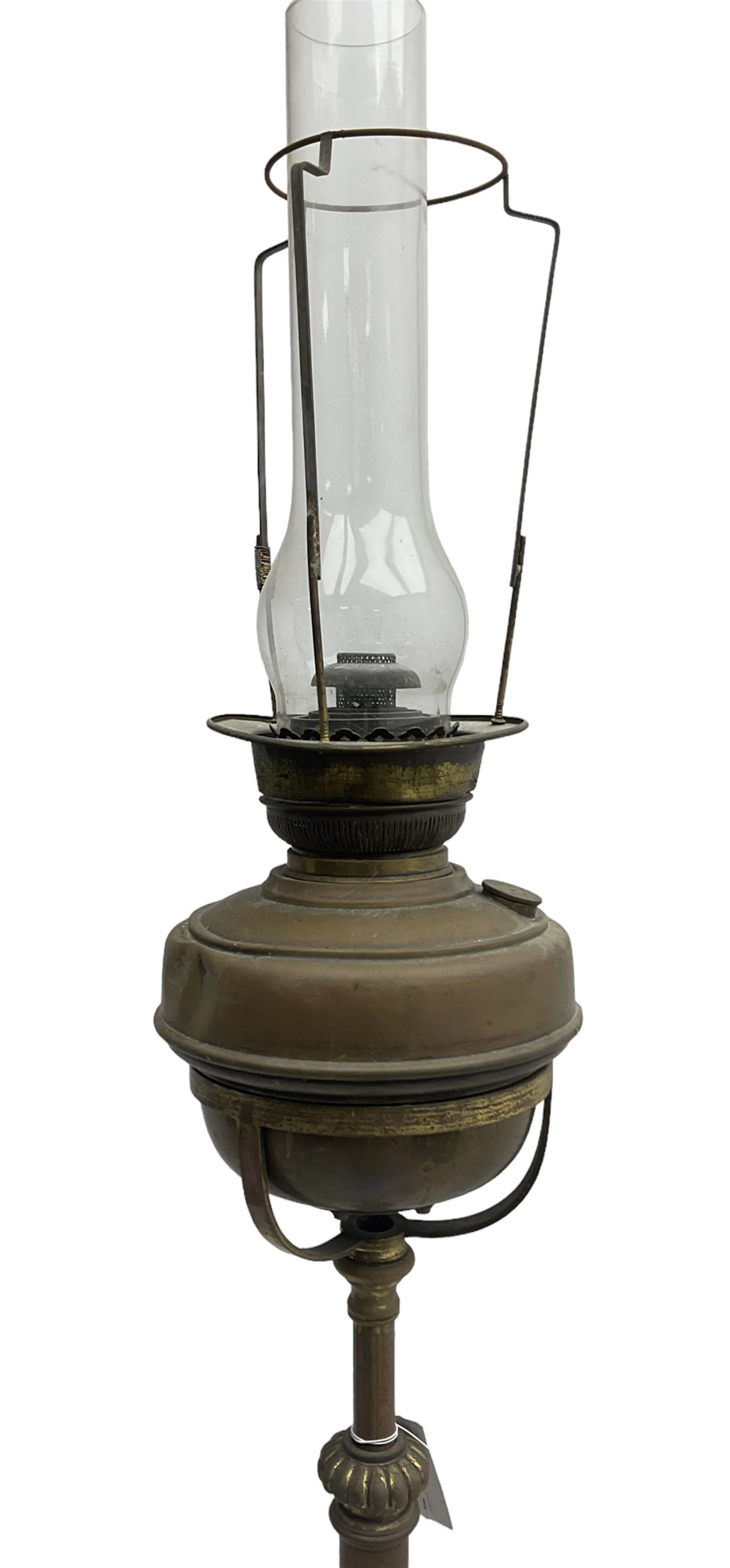 Victorian standard oil lamp, turned column with scrolled supports (H168cm); together with a small antique oil lamp (2)