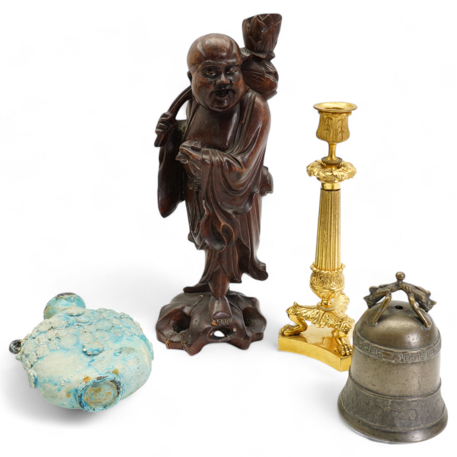 Chinese bronze bell with mythological animal handle H15cm, Eastern turquoise flask with applied floral decoration, Chinese carved hardwood figure of a Deity holding a Lotus flower H37cm and an ormolu candlestick 