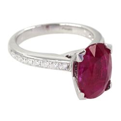 18ct white gold oval cut ruby ring, with channel set diamond shoulders, hallmarked, ruby approx 2.75 carat