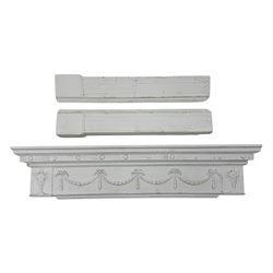 Adam's design Neoclassical-style painted plaster fire surround, adorned with garland swags...