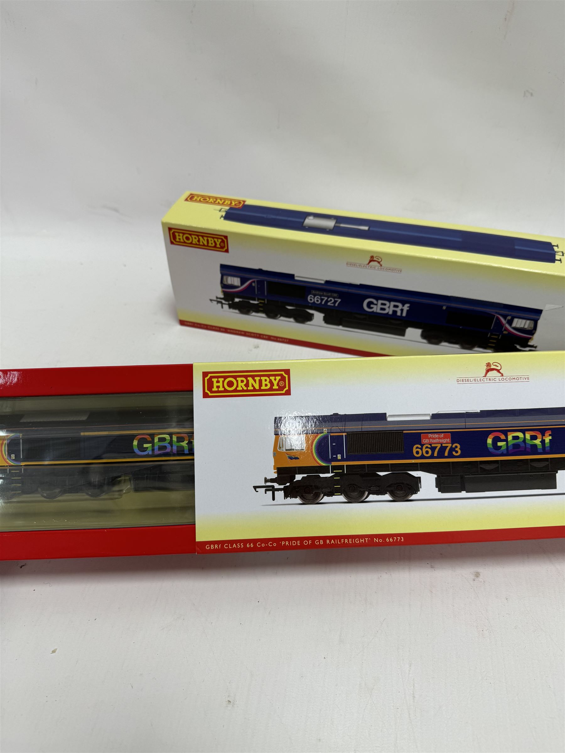 Three Hornby '00' gauge Class 66 Co-Co diesel electric locomotives, comprising R3881 Class 66 GBRf Andrew Scott CBE no. 66727, R30023 Class 66 GBRf Pride of GB Railfreight no. 66773 and R3039 Class 67 DB Schenker Bo-Bo diesel electric locomotive Keith Heller, all boxed 