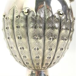 Victorian silver plated claret jug, the body of baluster form, with scroll handle, textured neck and the base cast with stiff leaves, on a beaded circular pedestal foot, H34.5cm 