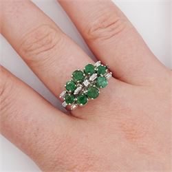 Round cut emerald , baguette cut and round brilliant cut diamond ring
